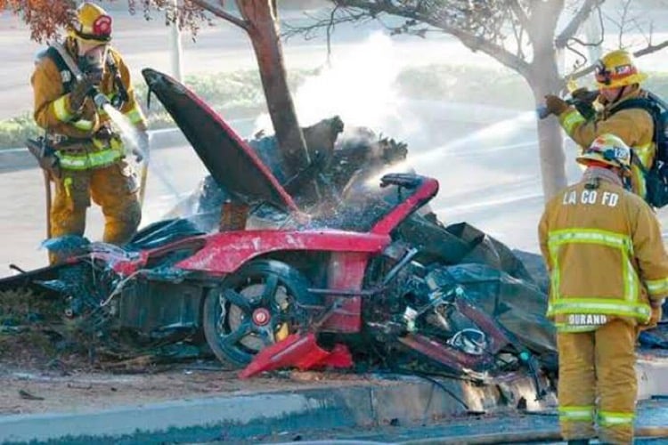 Paul Walker crash site scene with complete wreckage of his car