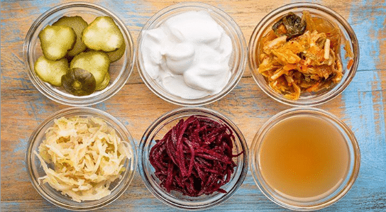 How To Get a Flat Stomach through increasing your intake of probiotics - Bornfertilelady